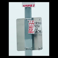 a street sign with graffiti on it